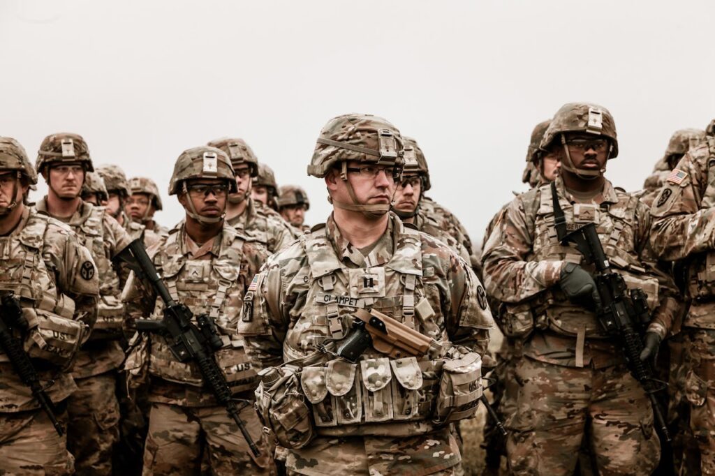 A Group of Soldiers Holding Rifles